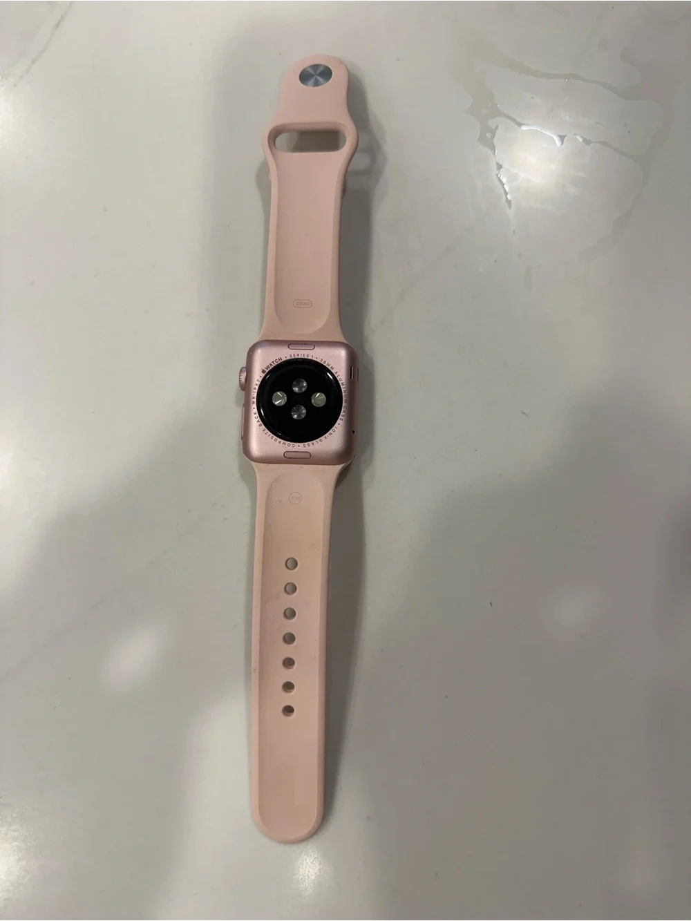 Apple Smartwatch, series 1 38mm with Pale Pink Silicone Band
